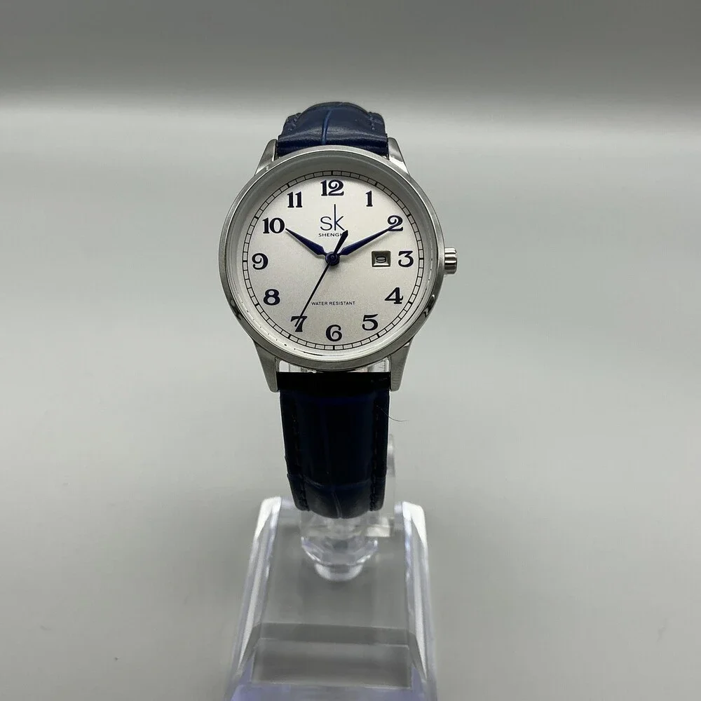 Shengke Womens Watch 32mm Silver Tone Blue Leather Band Date New Battery